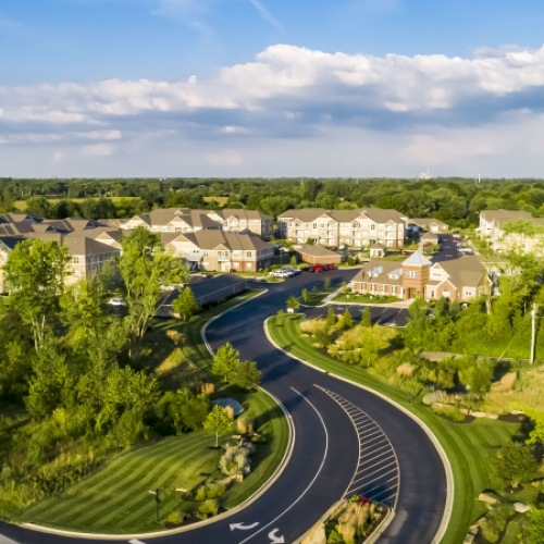 Your New Home Awaits aerial photo of community