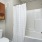 a bathroom with a shower curtain