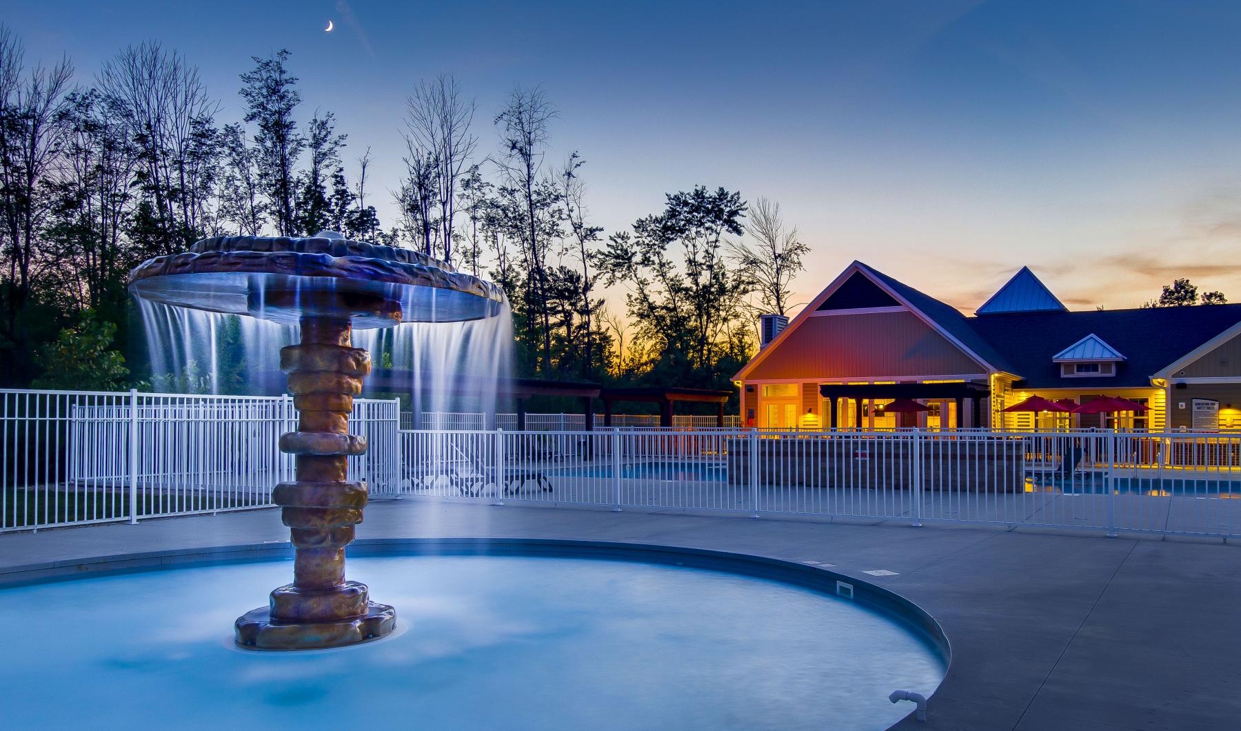 Settle into comfort at Residences on Ronald Reagan a fountain in a snowy place